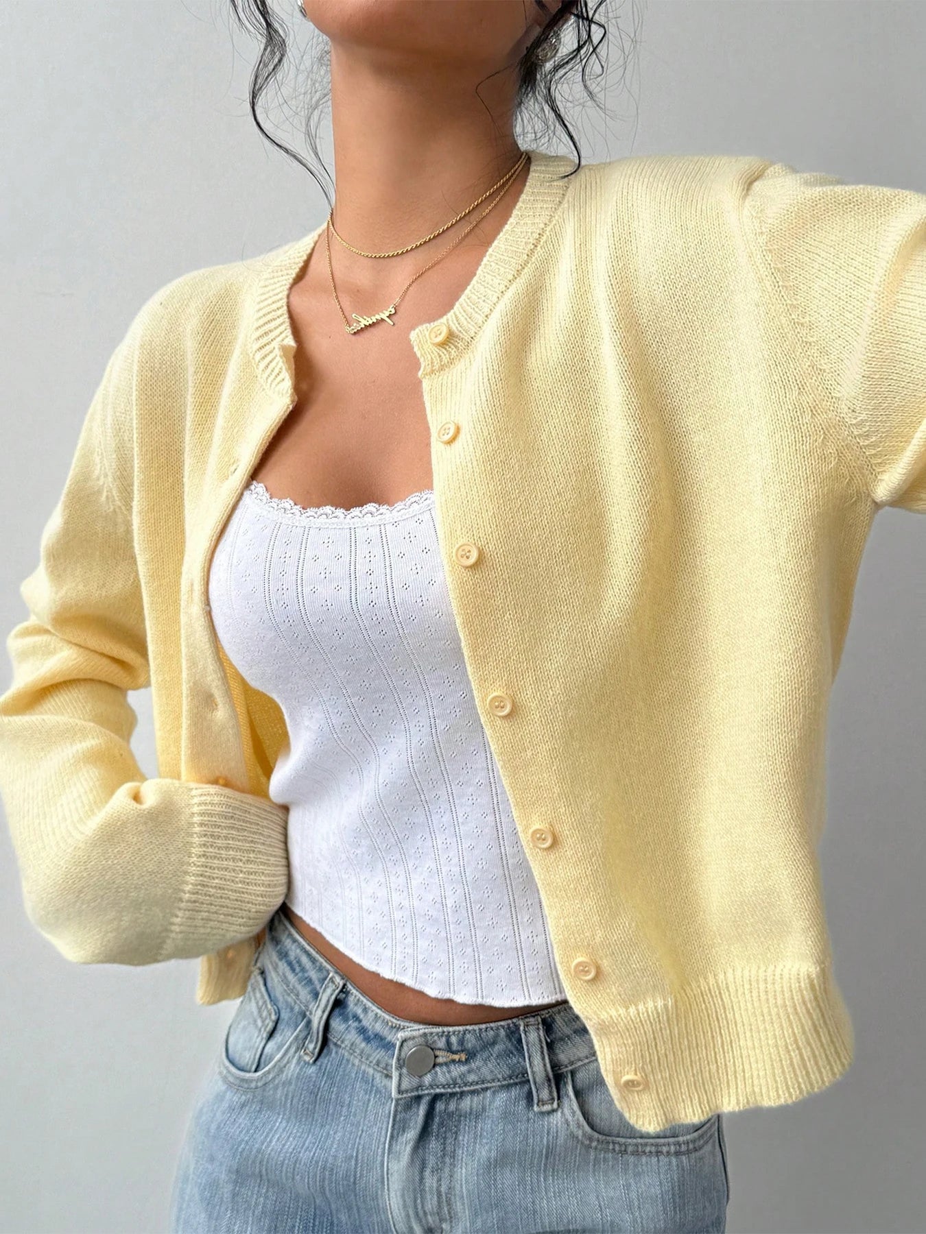 Autumn and winter new simple plain color long sleeved cardigan knitted sweater
