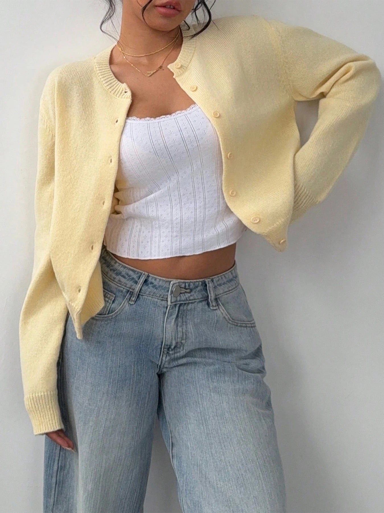 Autumn and winter new simple plain color long sleeved cardigan knitted sweater