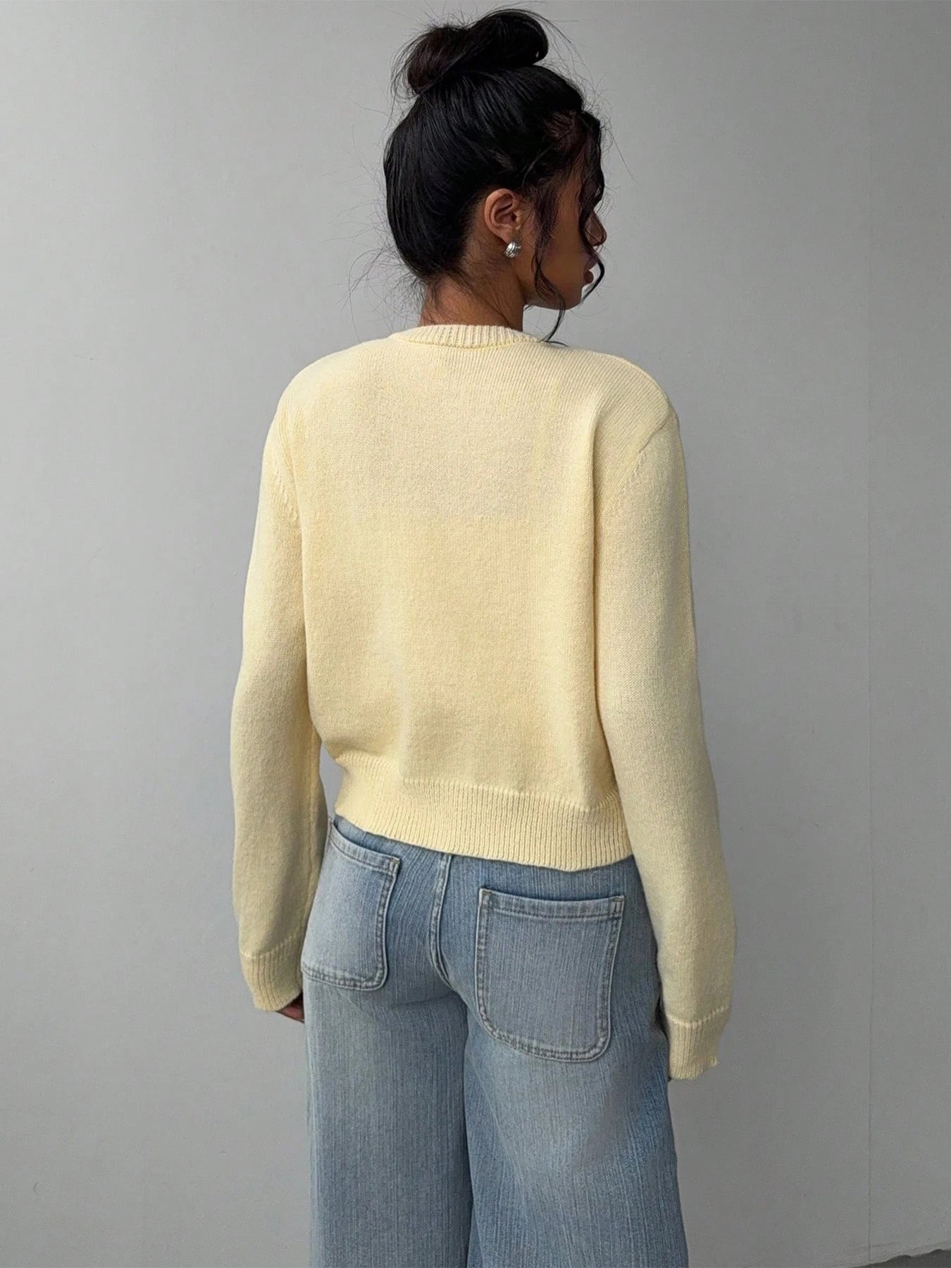 Autumn and winter new simple plain color long sleeved cardigan knitted sweater